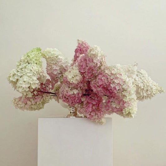 Elegant white green pink floral arrangement art by castor presenting hair claw clips durable, lightweight, and perfect for thick hair . Ideal for effortless everyday hairstyles.