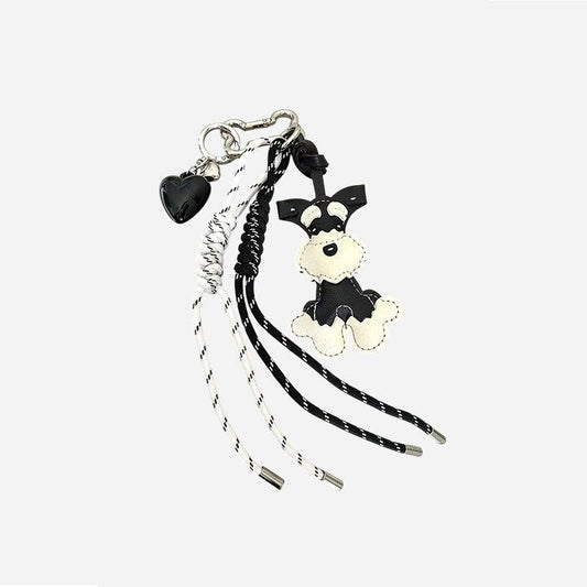 Handcrafted leather dog bag charm in Schnauzer shape, elegant handbag ornament and gift for dog owners and fashion enthusiasts