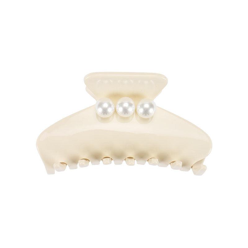 Classic high quality Big Effing Clip style bio-acetate big/middle size strong grip/non-fading/hand-assembled hair clip featuring a clean chic design with exquisite pearl and modern white color ,perfect for thick/long/middle/thin/curly hair in everyday hairstyle inspiration or hair care routine. Styled against a white background.