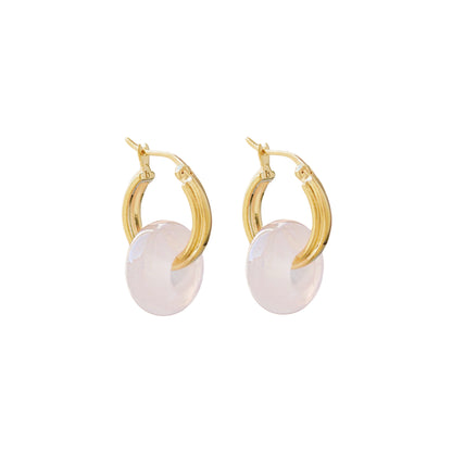 ROSIE ROSE QUARTZ HOOP EARRINGS Delicate rose quartz hoop earrings featuring polished gemstones and a sleek metal finish, adding a touch of elegance and charm to any look