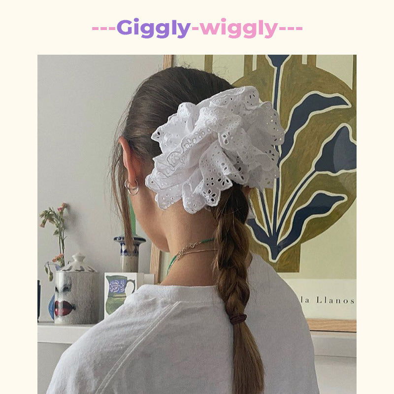 Sweet Dreams Scrunchie in White Daffodil oversized Soft and stylish cotton linen lace scrunchie feature a linen decorated design for added charm. A must-have statement accessory, they can be styled as bracelets or used to adorn any bun, completing your daytime look.