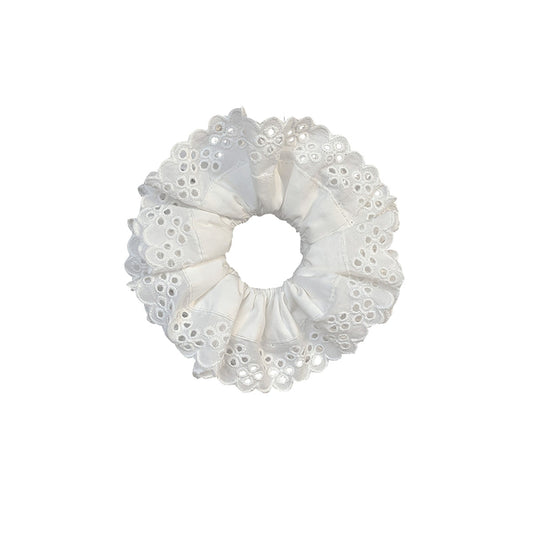 Sweet Dreams Scrunchie in White Daffodil oversized Soft and stylish cotton linen lace scrunchie feature a linen decorated design for added charm. A must-have statement accessory, they can be styled as bracelets or used to adorn any bun, completing your daytime look.