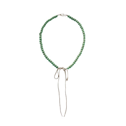 Chloe VINTAGE GREEN BEADED RIBBON NECKLACE featuring a clean chic bow design of Dyed green quartz & Glass beads in small size and vintage green color with gold necklace clasp ,perfect for dailylife/party/office/casual occasion. Styled against a white background.