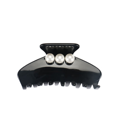 Classic high quality Big Effing Clip style bio-acetate big/middle size strong grip/non-fading/hand-assembled hair clip featuring a clean chic design with exquisite pearl and modern white color ,perfect for thick/long/middle/thin/curly hair in everyday hairstyle inspiration or hair care routine. Styled against a white background.