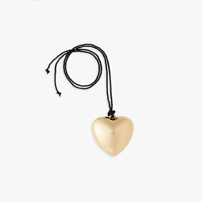 Puffy 3D Heart Necklace featuring a clean chic design and modern nature gold and black braided rope  ,perfect for dailylife/party/office/casual occasion. Styled against a white background.