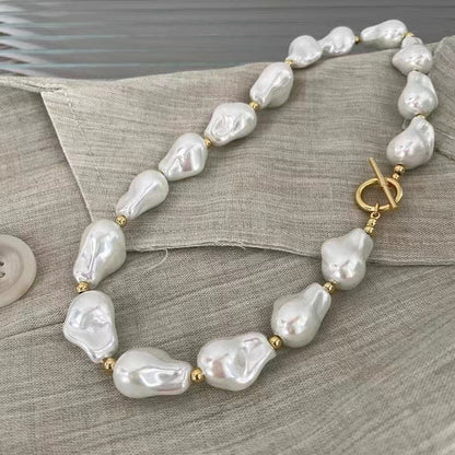 BAROQUE HOLOGRAPHIC PEARL WILMA PEARL NECKLACE featuring a clean chic design and modern white color ,perfect for dailylife/party/office/casual occasion. Styled against a cotton background. 