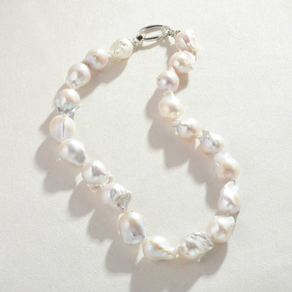 BAROQUE HOLOGRAPHIC PEARL WILMA PEARL NECKLACE featuring a clean chic design and modern white color ,perfect for dailylife/party/office/casual occasion. Styled against a white background.