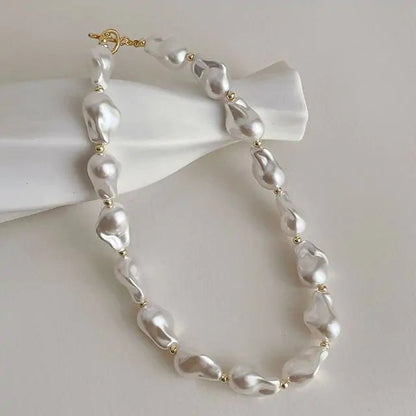 BAROQUE HOLOGRAPHIC PEARL WILMA PEARL NECKLACE featuring a clean chic design and modern white color ,perfect for dailylife/party/office/casual occasion. Styled against a white background.