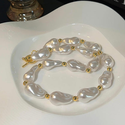 BAROQUE HOLOGRAPHIC PEARL WILMA PEARL NECKLACE featuring a clean chic design and modern white color ,perfect for dailylife/party/office/casual occasion. Styled against a white plate background.