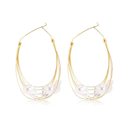 GORGEOUS GIANT BAROQUE PEARL GOLD HOOP EARRINGS featuring a clean chic design and modern white color ,perfect for dailylife/party/office/casual occasion. Styled against a white background.