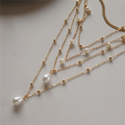 MULTI LAYER WATER DROP PEARL PENDANT WEDDING NECKLACE featuring a clean chic design and modern nature gold and pearl color ,perfect for dailylife/party/office/casual occasion. Styled against a white background.