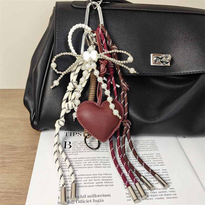 red heart string Premium bead pearl bow  bag charm, handcrafted in a unique character design, fashionable pink ornament for bags and gifts