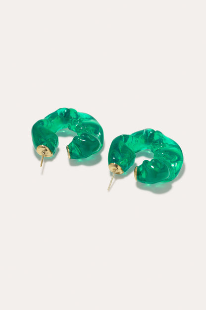 CULT STATEMENTPIECES BLUE BIO RESIN GOLD VERMEIL EARRINGS featuring a clean chic hoop design and modern jelly green color ,perfect for dailylife/party/office/casual occasion. Styled against a white background.