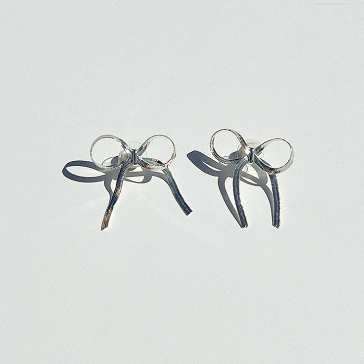 LILY GORGEOUS SILVER BOW EARRINGS