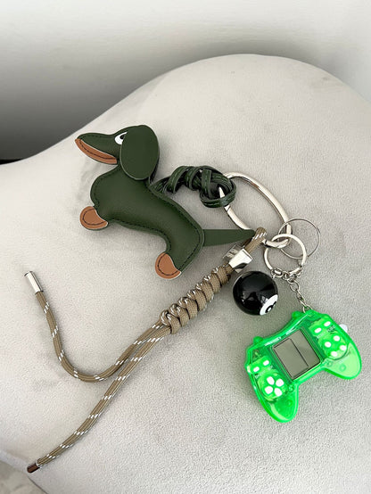 Handcrafted leather dog camera baseball bag charm in dachshund shape, elegant handbag ornament and gift for dog owners and fashion enthusiasts