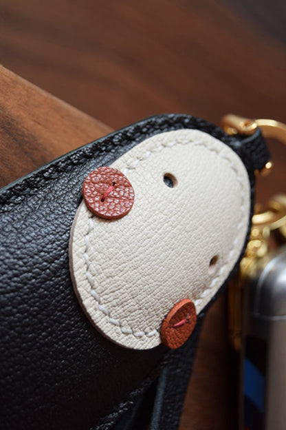 Luxury cute no face leather bag charm in black, handcrafted for handbag decoration, tote personalization, and unique gifts