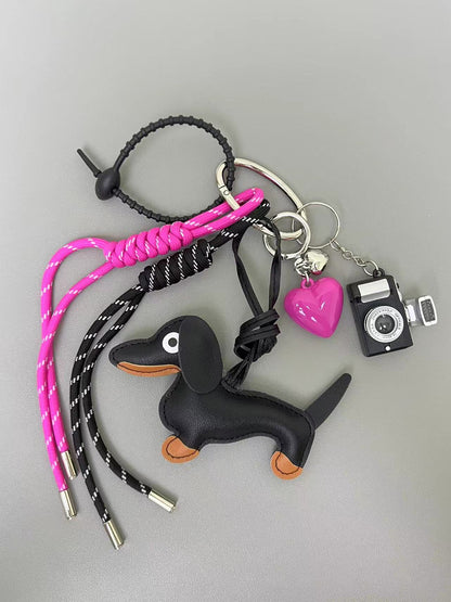 Handcrafted leather dog camera baseball bag charm in dachshund shape, elegant handbag ornament and gift for dog owners and fashion enthusiasts