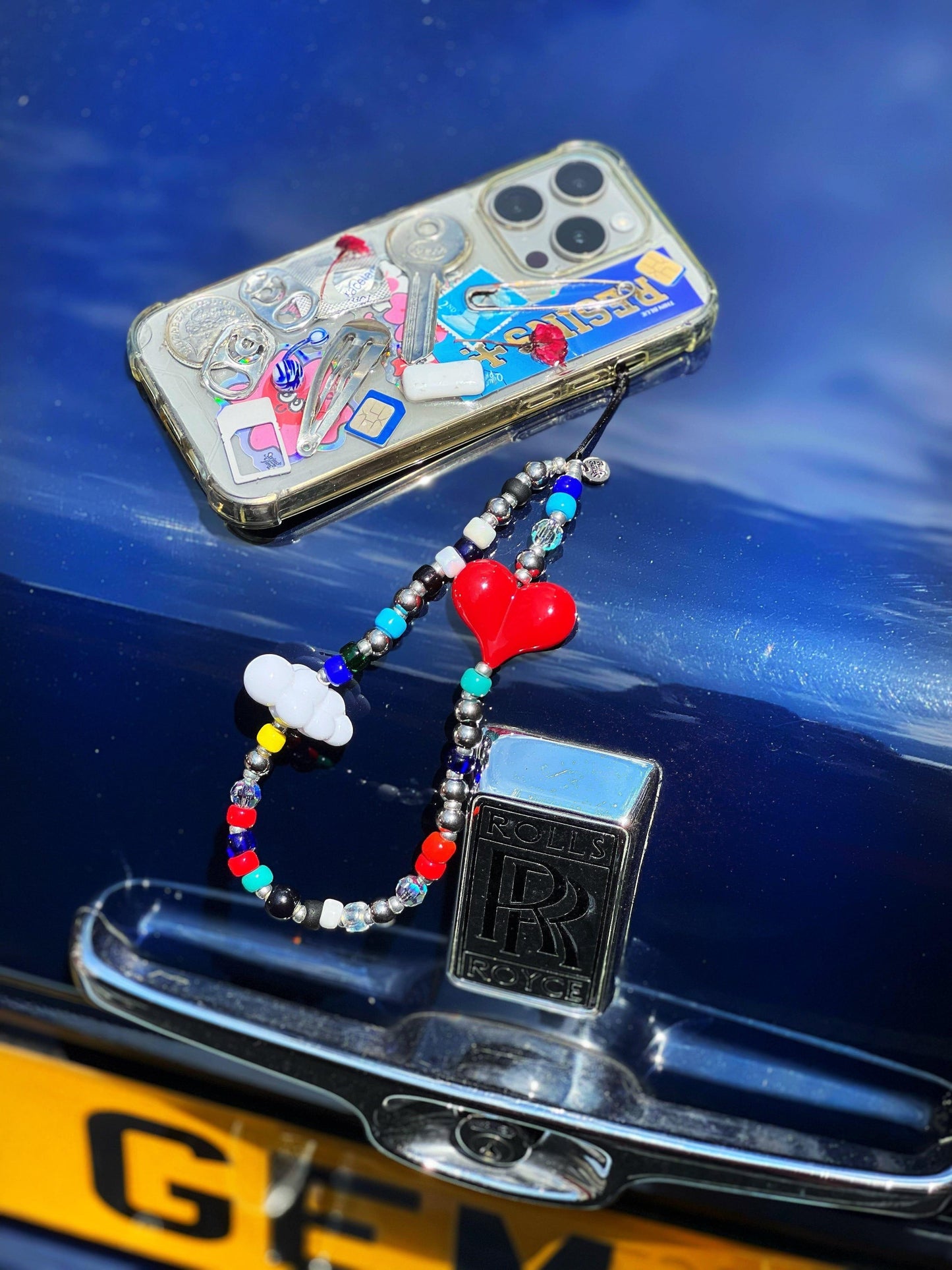 Love In The Clouds Wristlet Phone Strap Stringting sale phone charm crafted with high-quality colorful beads—perfect for accessorizing phones with a minimalist, stylish touch. A must-have essential and a thoughtful gift idea for women.