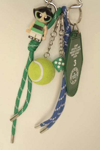 Premium tennis powerpuff dice bow  bag charm, handcrafted in a unique character design, fashionable pink ornament for bags and gifts