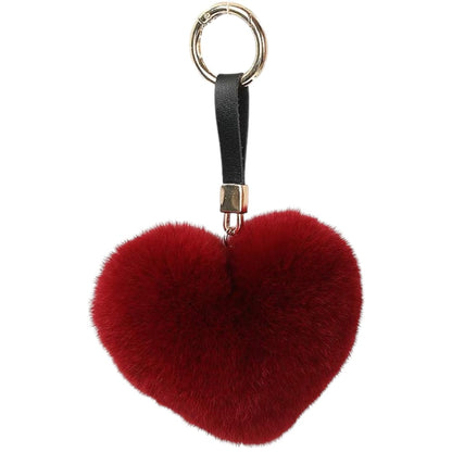 Genuine Rex Rabbit Hair Fur Pompom Keychain Heart Shaped Bag Charm Ring Fluffy Fur Ball featuring a clean chic design and fluffy red classic color ,perfect for daily /party/casual/office bagcharm/chain charm decoration . Styled against a white background.