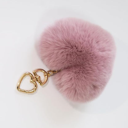 Genuine Rex Rabbit Hair Fur Pompom Keychain Heart Shaped Bag Charm Ring Fluffy Fur Ball featuring a clean chic design and fluffy pinky classic color ,perfect for daily /party/casual/office bagcharm/chain charm decoration . Styled against a white background.