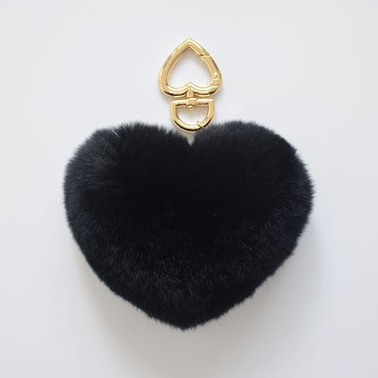 Genuine Rex Rabbit Hair Fur Pompom Keychain Heart Shaped Bag Charm Ring Fluffy Fur Ball featuring a clean chic design and fluffy black classic color ,perfect for daily /party/casual/office bagcharm/chain charm decoration . Styled against a white background.