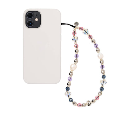 Lisa Venus Pearl Trap Wristlet Phone Strap Close-up of a stylish wristlet phone strap in durable material, featuring a secure loop for easy carrying and a sleek high quality white pearl and rhinestones bead design for everyday convenience