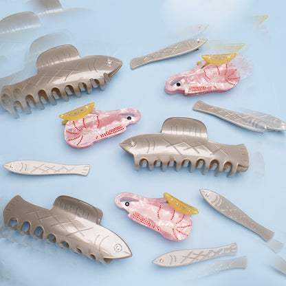 Jennie Sea Herring Fish Claw Hair Claw  Shop Bowsatelier dainty and affordable bio-acetate hair claw clips – durable, lightweight, and stylish hair accessories for all-day comfort. Perfect for updos, casual styles, and gifting. Available in unique designs and vibrant colors to elevate your look