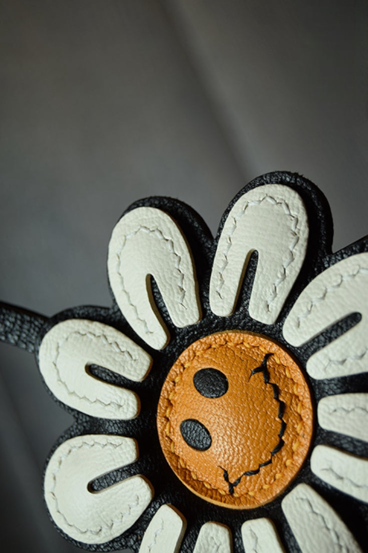 Smile Sunflower Handcrafted leather  bag charm, eco-friendly luxury accessory for tote bags, crossbody bags, and gifts.