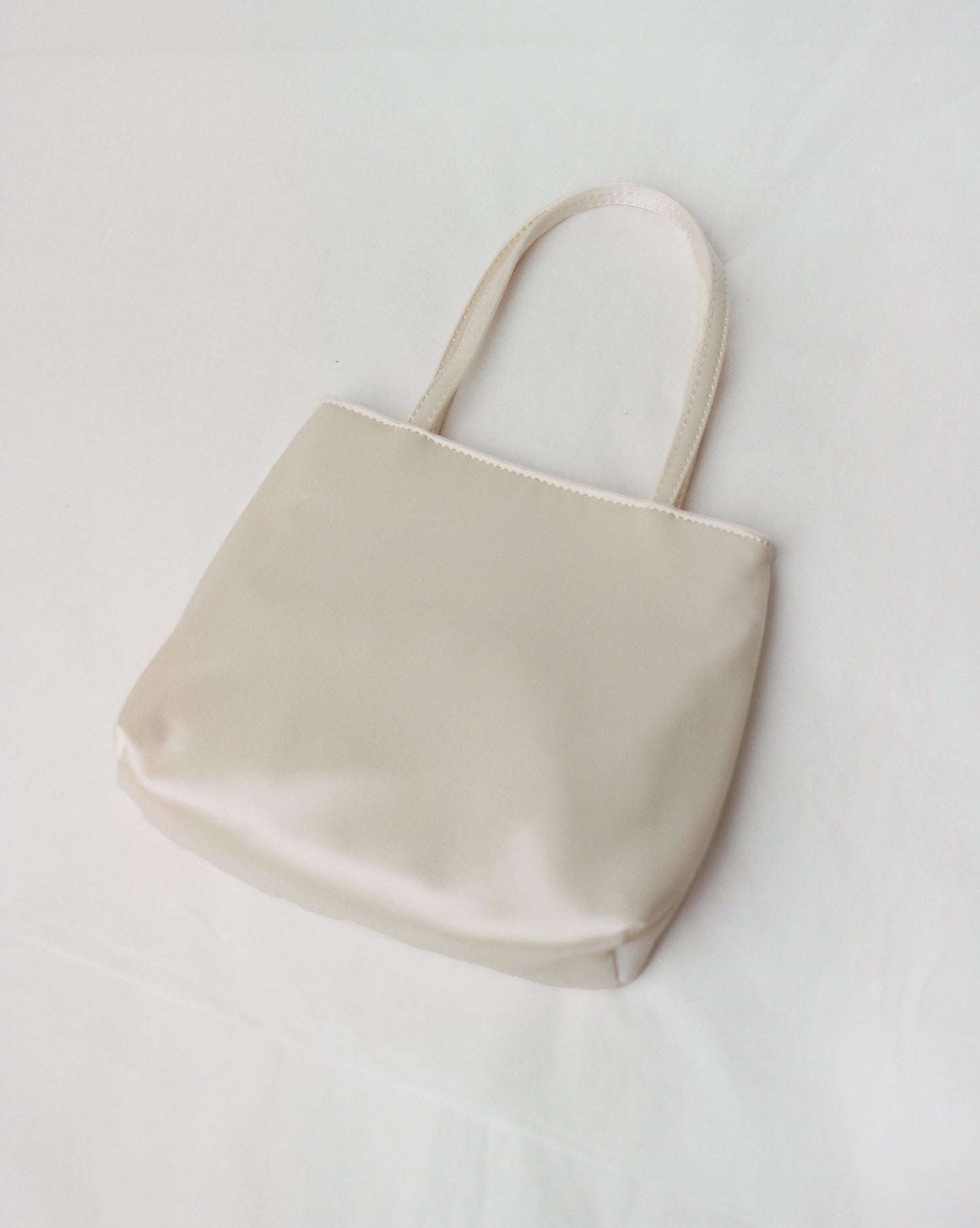 MILA LITTLE SILK BAG IN IVORY