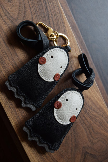 Luxury cute no face leather bag charm in black, handcrafted for handbag decoration, tote personalization, and unique gifts