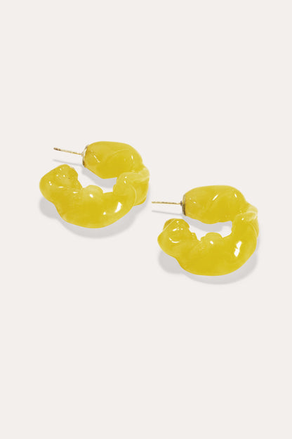 CULT STATEMENTPIECES BLUE BIO RESIN GOLD VERMEIL EARRINGS featuring a clean chic hoop design and modern jelly yellow color ,perfect for dailylife/party/office/casual occasion. Styled against a white background.