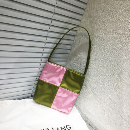 MILA LITTLE SILK BAG IN pink and green Elegant silk tote handbag with a smooth finish, spacious interior, and sturdy handles, perfect for adding a touch of luxury to any outfit